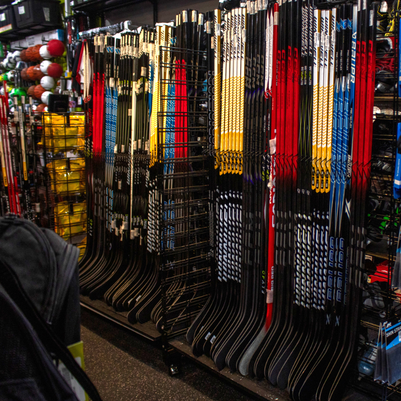 Rack of hockey sticks